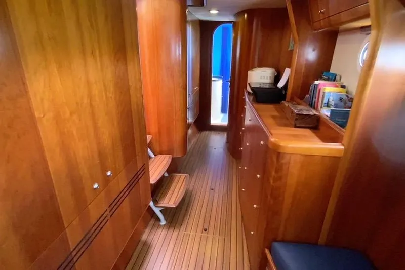  Yacht Photos Pics Luxurious wooden interior of 2003 Catana 522 Ocean Class yacht hallway.