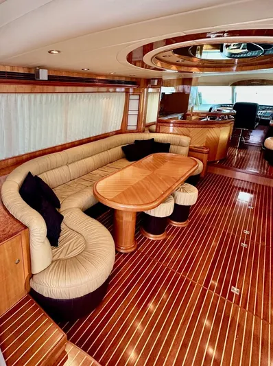 Osprey Yacht Photos Pics Luxurious 2004 Horizon P70 yacht interior with elegant wood flooring and plush seating.