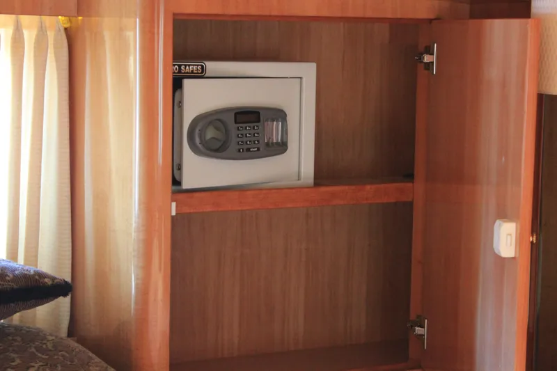 Osprey Yacht Photos Pics Safe inside wooden cabinet of 2004 Horizon P70 model.