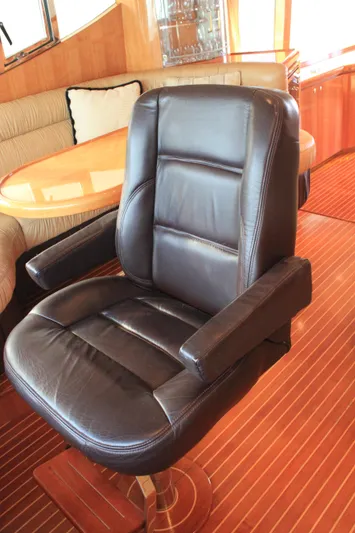 Osprey Yacht Photos Pics Luxurious leather chair in 2004 Horizon P70 yacht interior.