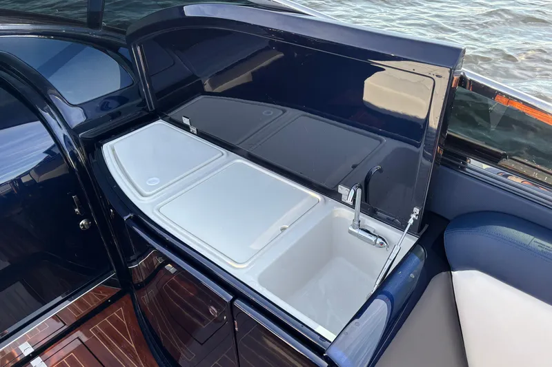  Yacht Photos Pics 2025 Riva Aquariva Special yacht sink and counter area with sleek design.