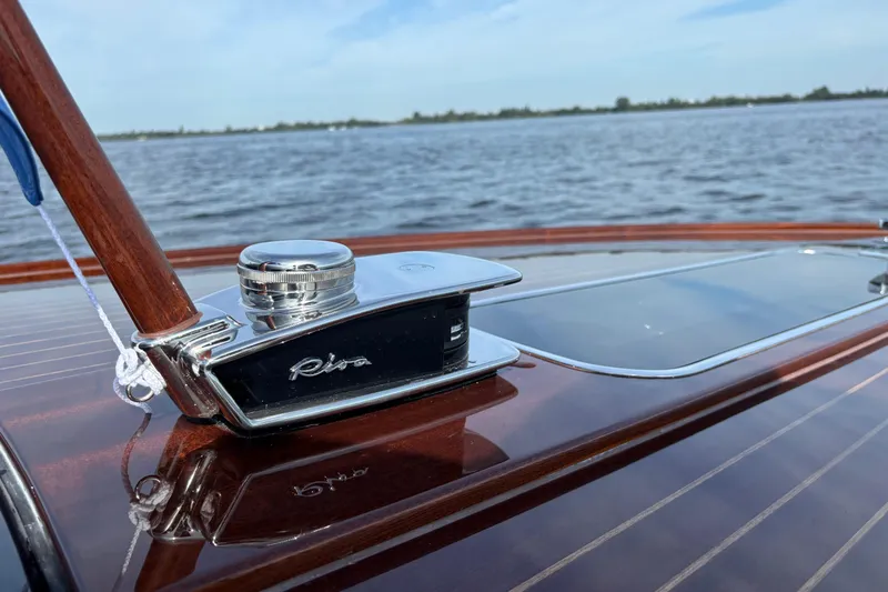  Yacht Photos Pics 2025 Riva Aquariva Special boat detail on water, showcasing sleek design and craftsmanship.