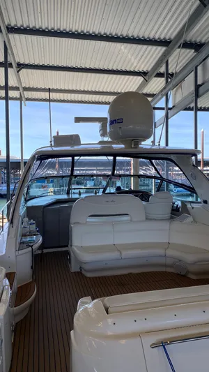  Yacht Photos Pics 2001 Sea Ray 460 Sundancer yacht with spacious deck and modern amenities.