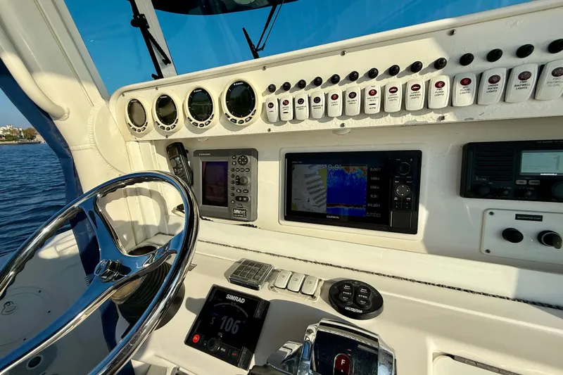 Salt Shaker Yacht Photos Pics 2008 Everglades 350 Center Console boat dashboard with navigation and control systems.