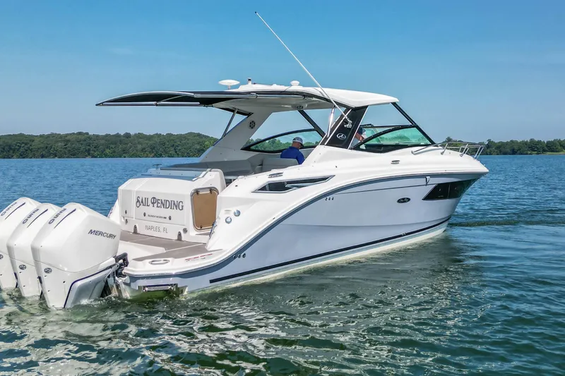 Sail Pending Yacht Photos Pics 2022 Sea Ray Sundancer 320 Outboard cruising on a serene lake.