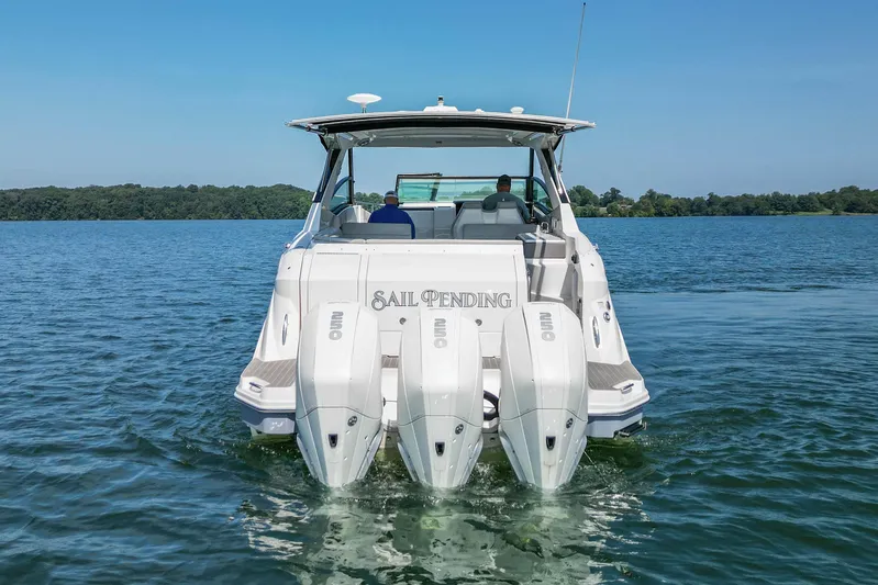 Sail Pending Yacht Photos Pics 2022 Sea Ray Sundancer 320 Outboard cruising on a serene lake.