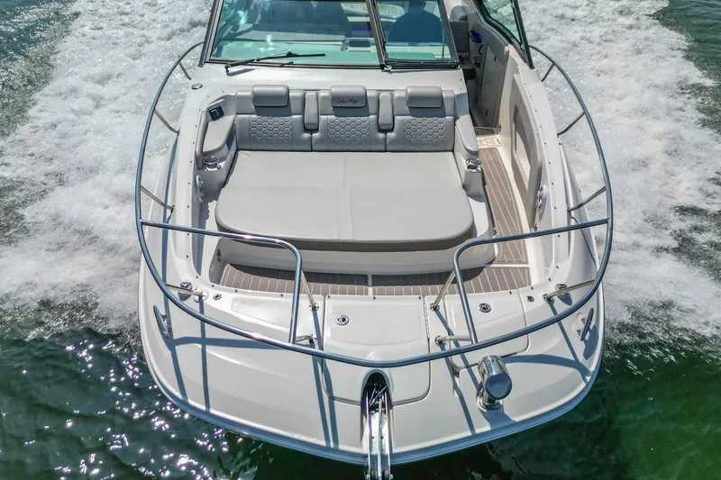 Sail Pending Yacht Photos Pics 2022 Sea Ray Sundancer 320 Outboard cruising on water, showcasing spacious deck and seating.