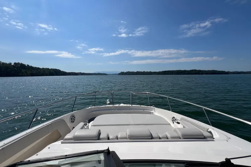 Sail Pending Yacht Photos Pics 2022 Sea Ray Sundancer 320 Outboard cruising on a sunny lake.