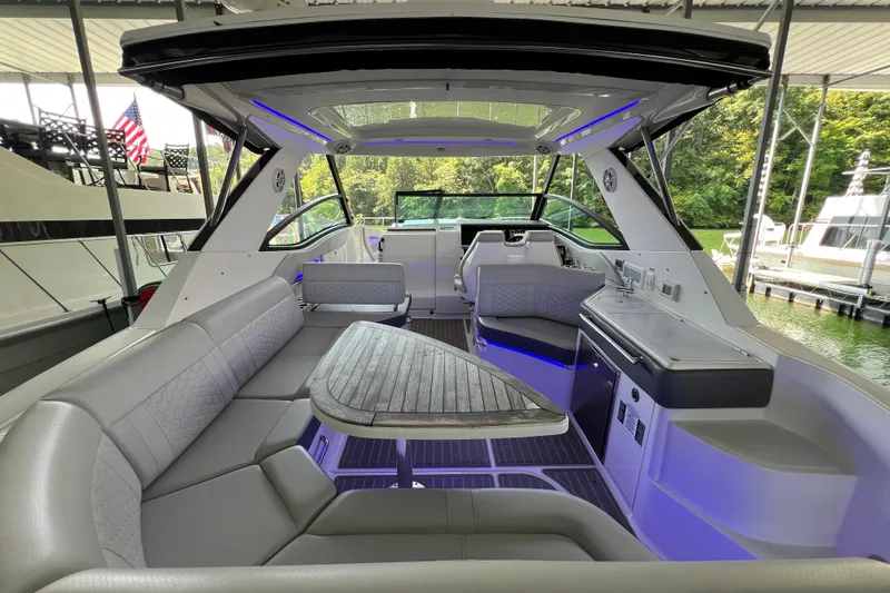 Sail Pending Yacht Photos Pics 2022 Sea Ray Sundancer 320 Outboard interior with luxurious seating and modern amenities.