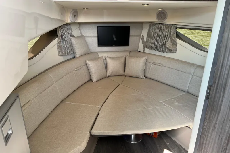 Sail Pending Yacht Photos Pics Interior of 2022 Sea Ray Sundancer 320 Outboard with cozy seating and TV.
