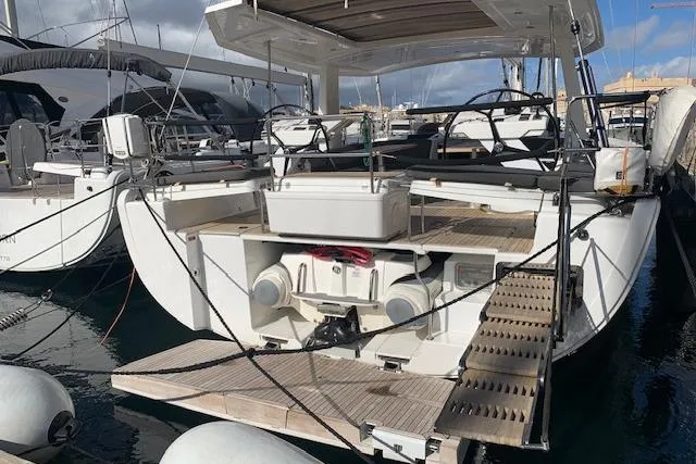  Yacht Photos Pics Sailing yacht Hanse 588, 2017 model, docked at marina with open deck view.