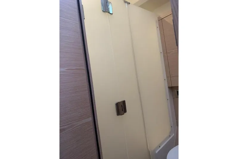  Yacht Photos Pics Interior of 2017 Hanse 588 yacht bathroom with modern shower design.
