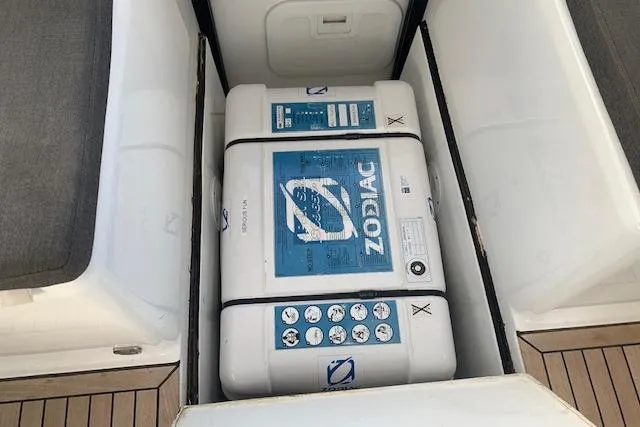  Yacht Photos Pics Storage compartment on a 2017 Hanse 588 yacht containing a Zodiac equipment box.
