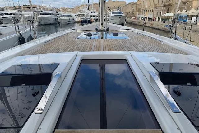  Yacht Photos Pics Deck view of 2017 Hanse 588 yacht docked in a marina.