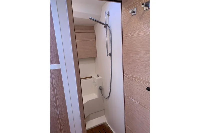  Yacht Photos Pics Compact shower area in 2017 Hanse 588 yacht with modern fixtures.