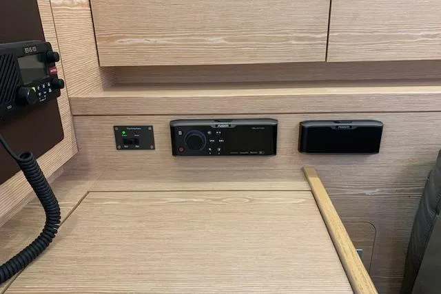  Yacht Photos Pics Control panel on a 2017 Hanse 588 yacht, featuring navigation and communication equipment.