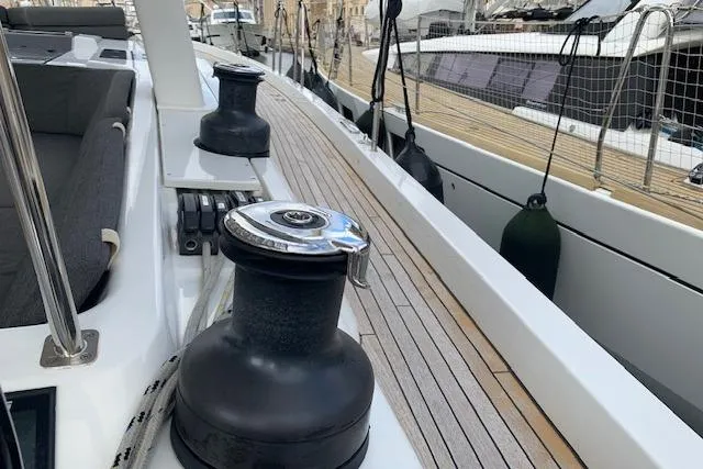  Yacht Photos Pics Deck view of 2017 Hanse 588 yacht, featuring winches and teak flooring.