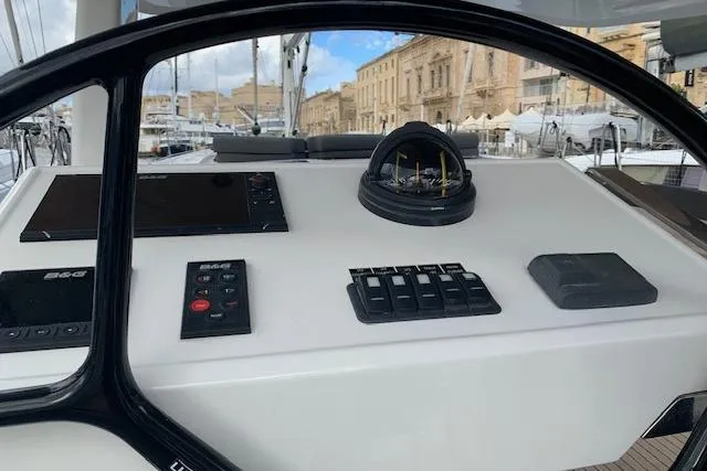  Yacht Photos Pics Helm of 2017 Hanse 588 yacht with navigation instruments and controls.