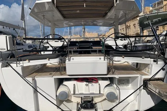  Yacht Photos Pics Hanse 588 yacht, 2017 model, featuring dual steering wheels and spacious deck area.