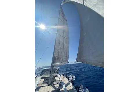  Yacht Photos Pics Sailing on a 2017 Hanse 588 yacht under clear blue skies.