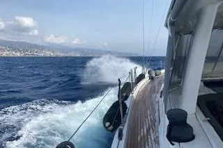  Yacht Photos Pics Sailing on a 2017 Hanse 588 yacht, cutting through ocean waves.