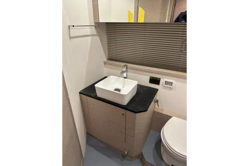  Yacht Photos Pics Modern bathroom in 2017 Rio Yachts Sport Coupe 44, featuring sleek sink and minimalist design.