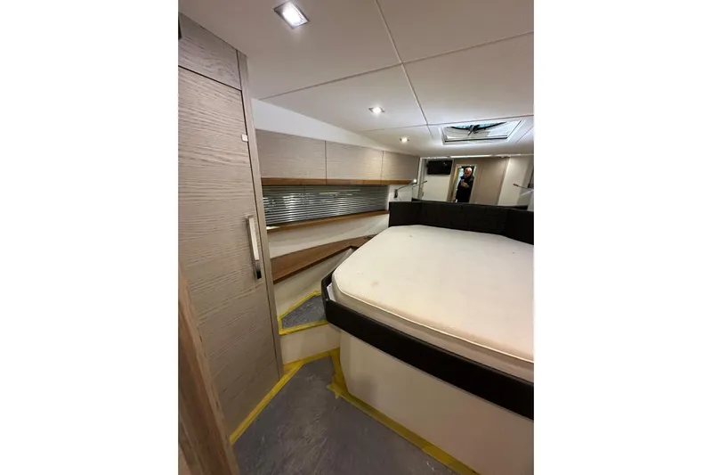  Yacht Photos Pics Interior of 2017 Rio Yachts Sport Coupe 44, featuring modern design and comfortable sleeping area.