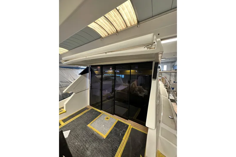  Yacht Photos Pics 2017 Rio Yachts Sport Coupe 44 interior with sleek design and glass doors.