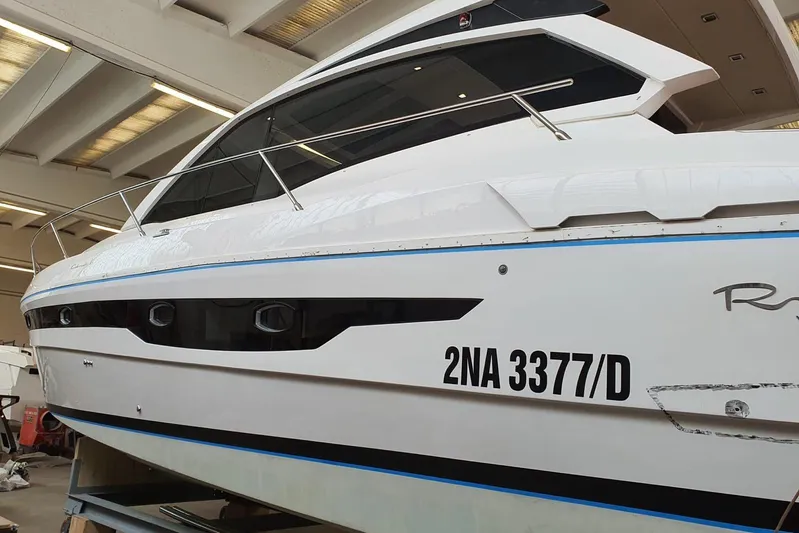  Yacht Photos Pics 2017 Rio Yachts Sport Coupe 44 in a showroom, showcasing sleek design and modern features.