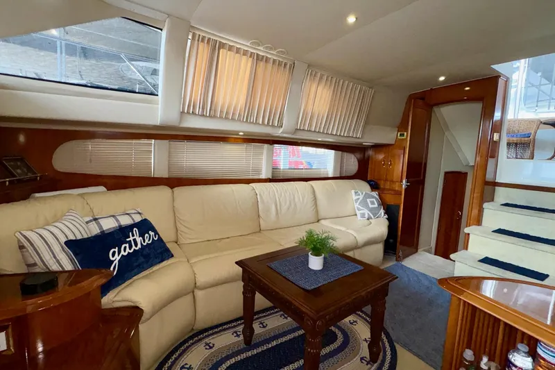  Yacht Photos Pics Luxurious interior of 2003 Carver 396 Motor Yacht with plush seating and elegant decor.