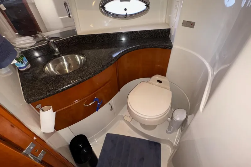  Yacht Photos Pics Bathroom interior of 2003 Carver 396 Motor Yacht with sink and toilet.
