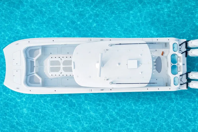 In Stock Opportunity Or New Order Yacht Photos Pics Aerial view of 2026 Front Runner 43 Catamaran on clear blue water.