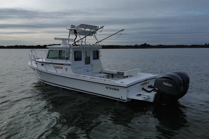 Daybreak Yacht Photos Pics 2023 Steiger Craft 31 Chesapeake boat on calm water with Yamaha engines.