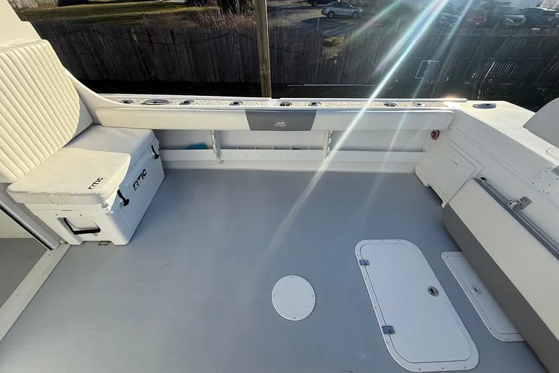 Daybreak Yacht Photos Pics 2023 Steiger Craft 31 Chesapeake boat deck with seating and storage compartments.