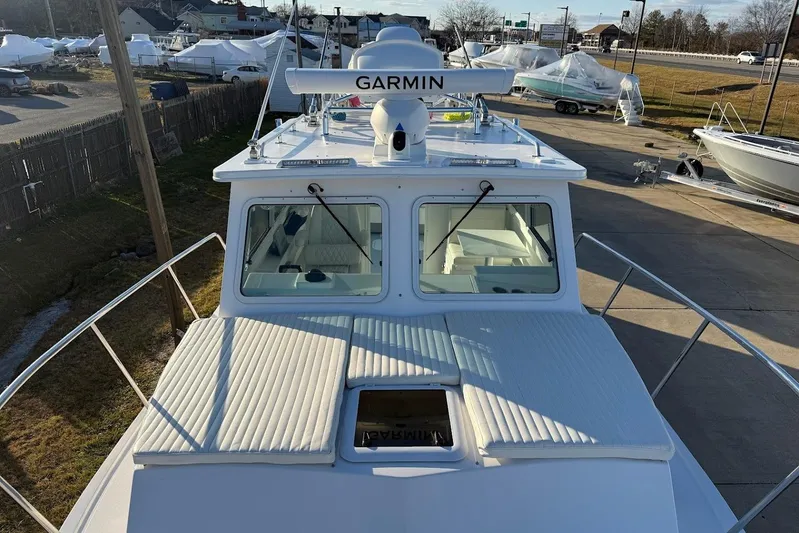 Daybreak Yacht Photos Pics 2023 Steiger Craft 31 Chesapeake boat with Garmin radar, docked outdoors.