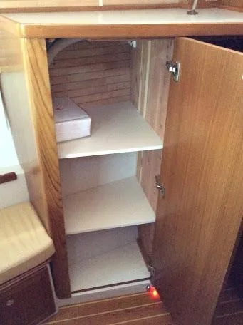 Catalina 425 In Stock Yacht Photos Pics 2024 Catalina 425 interior wooden cabinet with open shelves.