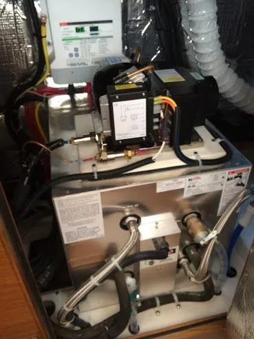 Catalina 425 In Stock Yacht Photos Pics Engine room of a 2024 Catalina 425 yacht, featuring mechanical components and wiring.