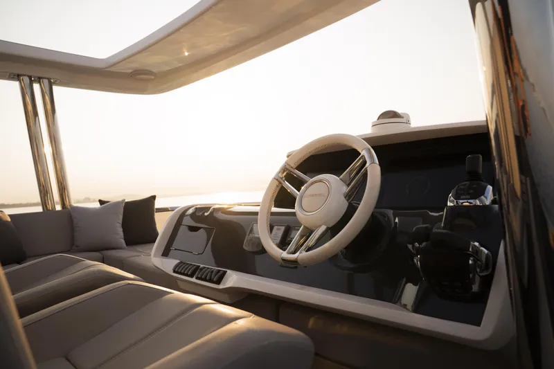 Travitude Yacht Photos Pics Luxurious Pearl 62 yacht interior with modern steering wheel, 2020 model.