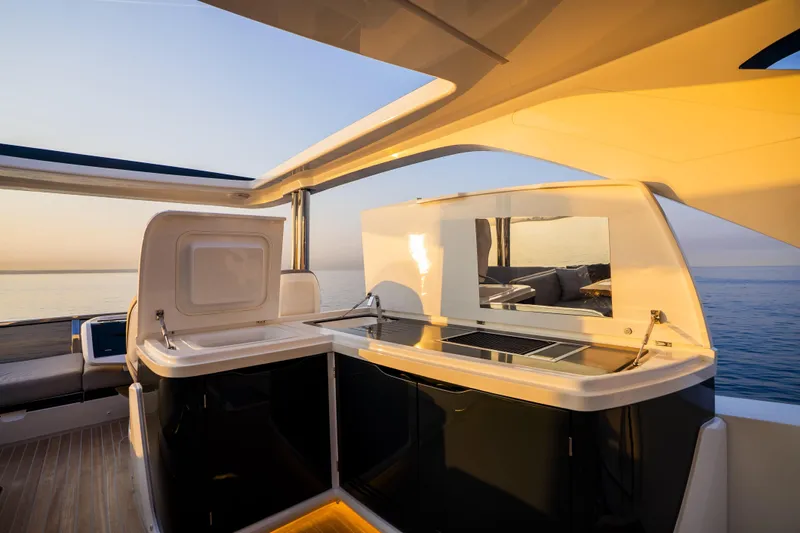 Travitude Yacht Photos Pics Luxurious Pearl 62 yacht kitchen area with ocean view, 2020 model.