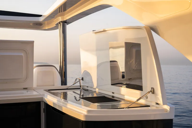Travitude Yacht Photos Pics Luxurious Pearl 62 yacht kitchen area with ocean view, 2020 model.