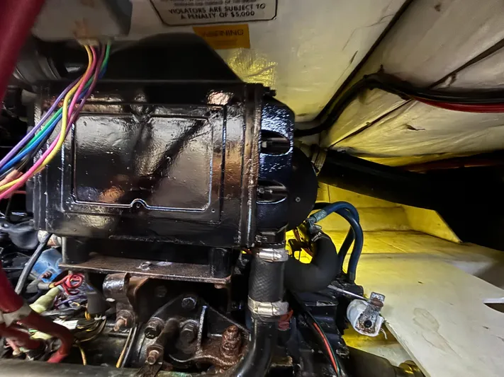  Yacht Photos Pics Engine compartment of a 1994 Bayliner 4700 boat, showing wiring and mechanical components.