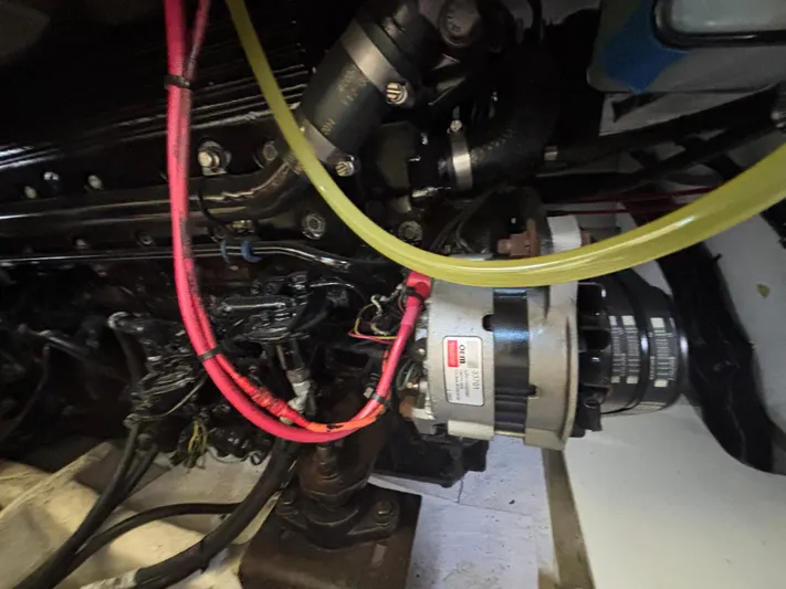  Yacht Photos Pics Engine compartment of a 1994 Bayliner 4700 boat, featuring visible wiring and components.