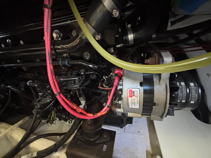  Yacht Photos Pics Engine compartment of a 1994 Bayliner 4700 with visible wiring and components.