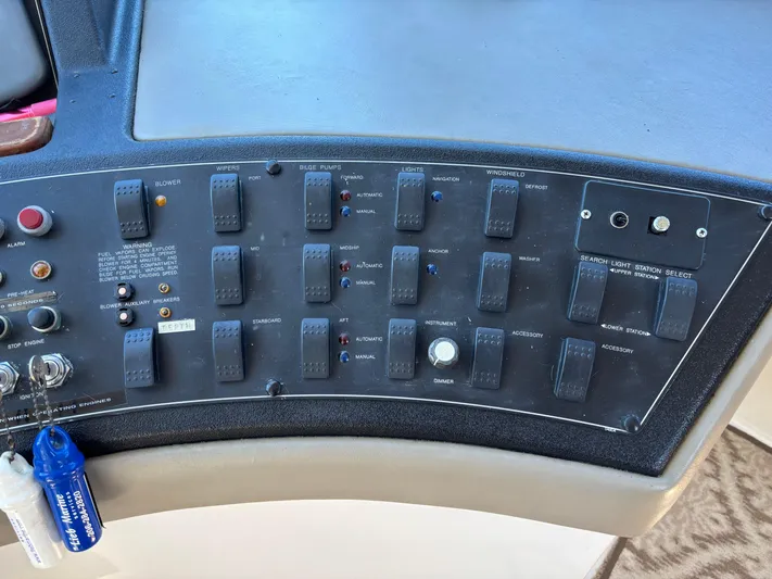  Yacht Photos Pics Control panel of a 1994 Bayliner 4700 boat with various switches and indicators.