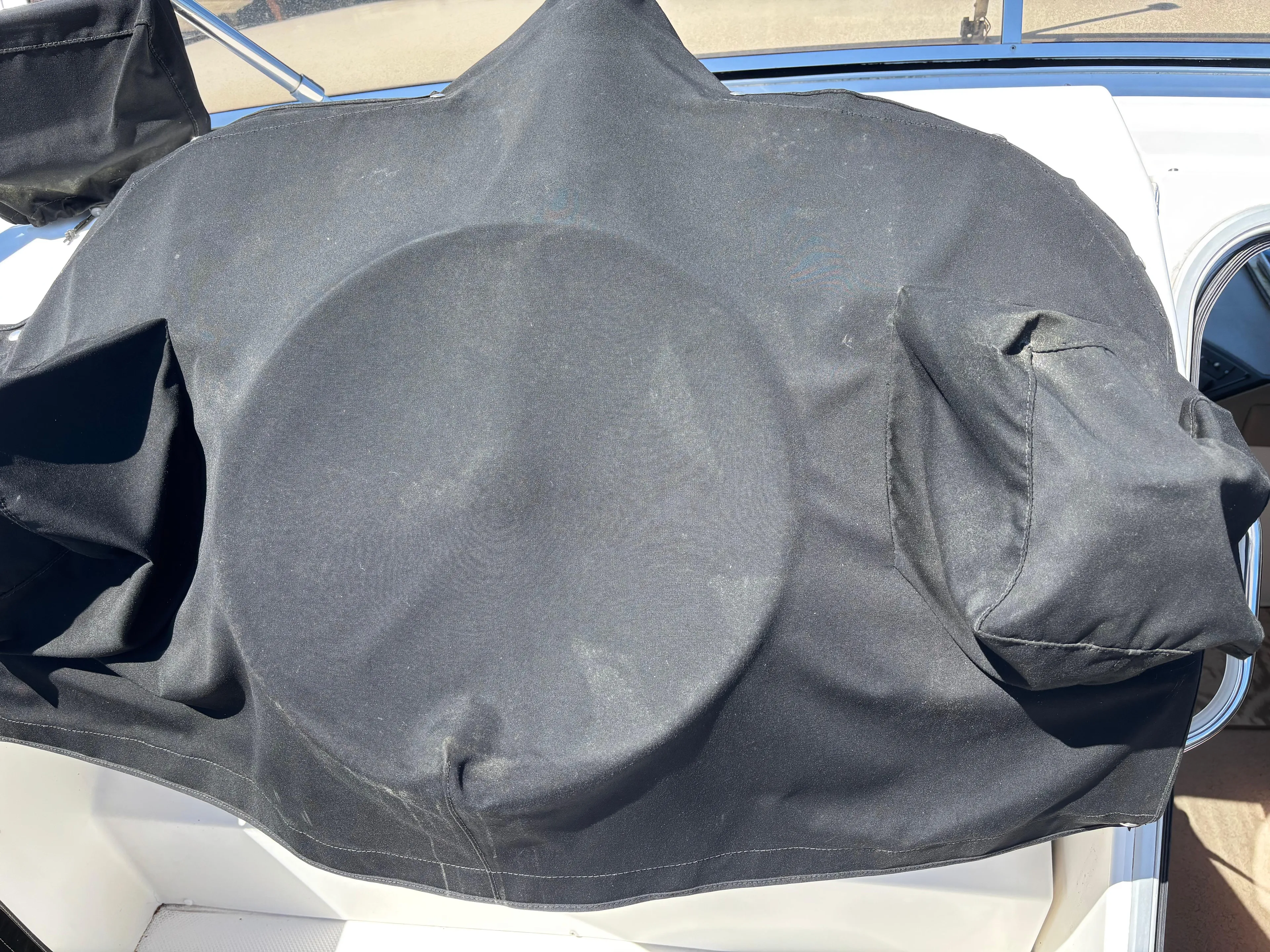  Yacht Photos Pics Black cover on Bayliner 4700 boat dashboard, 1994 model.