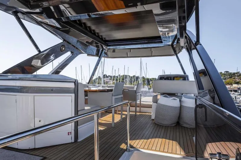  Yacht Photos Pics Luxurious 2022 Ferretti Yachts 720 deck with modern seating and sleek design.