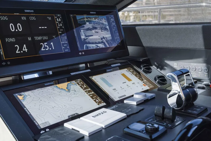  Yacht Photos Pics Cockpit of 2022 Ferretti Yachts 720 with advanced navigation displays and controls.