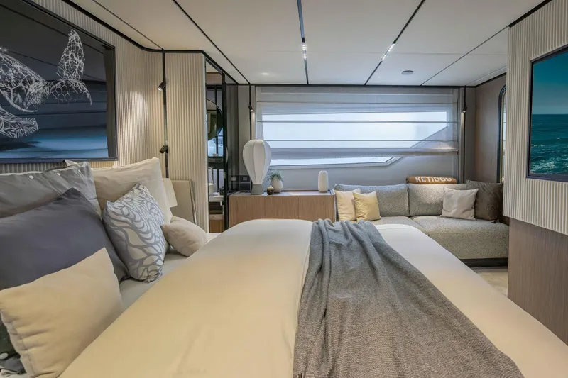  Yacht Photos Pics Luxurious bedroom interior of 2022 Ferretti Yachts 720, featuring elegant decor and modern furnishings.