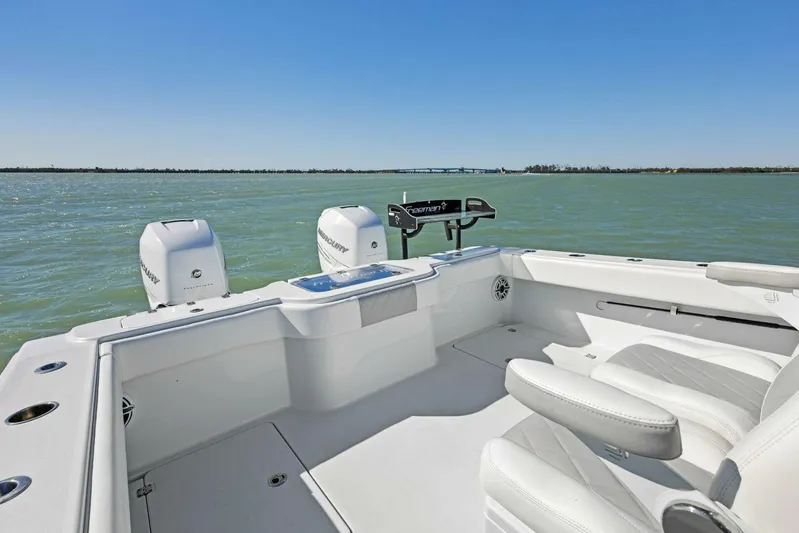  Yacht Photos Pics Freeman 34VH 2022 boat interior with dual engines on a calm sea.