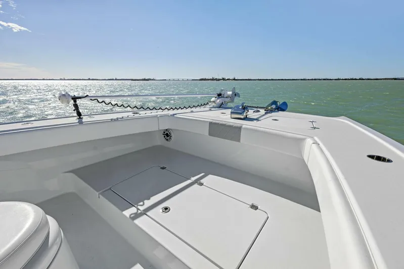  Yacht Photos Pics 2022 Freeman 34VH boat deck with ocean view under clear blue sky.